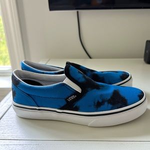 Kids size 3 vans slip on sneakers. Never worn, new with tags.